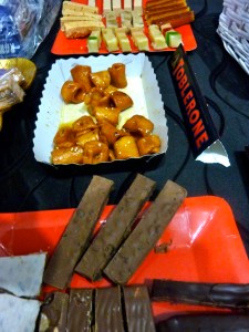 Table set for Christmas Eve. Turrones Chocolates Cookies and in the center of the Pic Pistiños are set out for us to enjoy by Luis' sister Ani